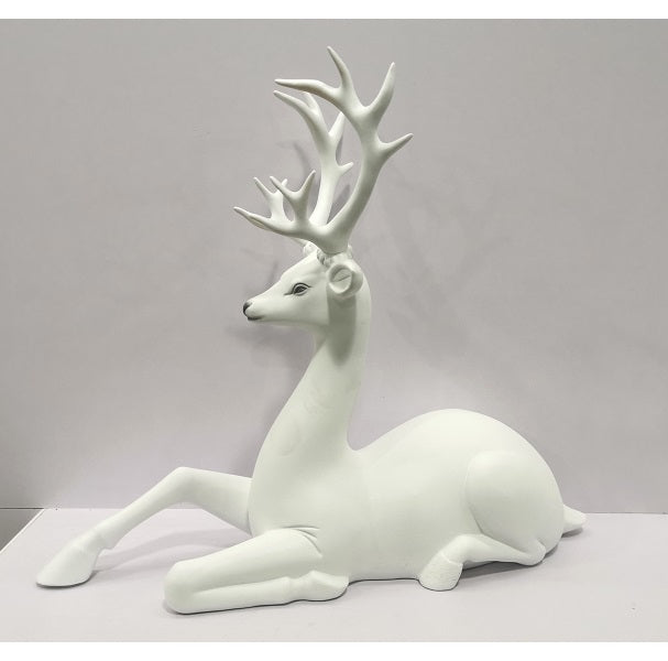 Sitting Reindeer in White